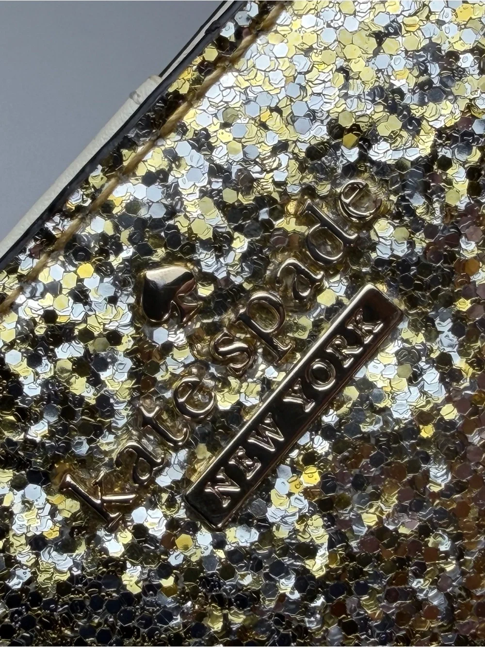kate spade Gold Glitter Folio wallet with magnetic closure - fun and flirty